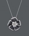 Accentuate your neckline with this bold bloom. Flower pendant features round-cut black diamond (1/3 ct. t.w.) petals with a round-cut white diamond center design and edging (1/5 ct. t.w.). Necklace crafted in sterling silver. Approximate length: 18 inches. Approximate drop: 1 inch.