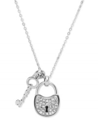 Secure your new look. This glitzy necklace from Fossil features lock and key pendants embellished with clear pave crystals. Crafted in polished stainless steel. Approximate length: 16 inches + 2-inch extender. Approximate drop: 7/8 inch.