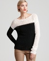 A vision in black and white, this breezy knit MARC BY MARC JACOBS sweater epitomizes casual-chic.