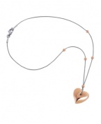 Make a sweet statement in this romantic heart pendant by Breil. Necklace features a stainless steel chain and lobster clasp closure with a rose gold ion-plated stainless steel heart and beaded accents. Approximate length: 17 inches. Approximate drop: 3/4 inch.