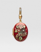 Garnet-colored CRYSTALLIZED - Swarovski Elements sparkle on this handcrafted, hand-enameled birthstone locket that opens to hold a favorite photo. Crystal Enamel 18k goldplated brass & brass-plated pewter Month indicated on the back Length, about 1¼ Width, about 1 Spring clip clasp Made in USA