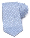 A subtle floral print gets set for spring on this silk and linen tie from The Men's Store at Bloomingdale's.