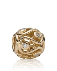 Serpentine lines reveal bezel-set diamond accents on this 14K gold PANDORA charm.