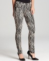 From a tropical canopy to the concrete jungle, these Isaac Mizrahi jeans enliven your everyday with a skinny silhouette in a statement zebra print. Team with sleek heels for a refined walk on the wild side.