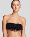 There's something fashion-forward about L*Space's fringed bandeau. Hinting at flirtatious but wholly feminine, this daring suit is destined to stun when you shimmy in the sun.