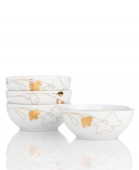 Wildflowers take off on glazed white porcelain, glowing as they tumble aimlessly around these Charter Club berry bowls. A banded edge adds a classic touch to a pattern with modern spirit.