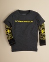 A sporty layered look combines the classic crewneck tee from Under Armour with cool tattoo-inspired sleeve insets.