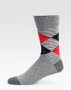 Smooth cotton combines a classic argyle pattern with simple stripes, accented with a signature logo detail.Mid-calf heightCottonMachine washImported