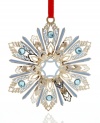 Ice-blue accents and a radiant silver shine give ChemArt's Jeweled Snowflake ornament a look of timeless holiday splendor.