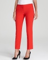 Sleek and sophisticated, classic VINCE CAMUTO pants get chic new edge with slim tailoring and statement color. Accentuate the ankle silhouette with pointy-toe pumps.