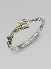 From the Naga Collection. This stylized design features a dragon in sleek sterling silver accented with 18k gold detailing. Sterling silver18k goldDiameter, about 2¼Slip-on styleImported 