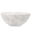 Embossed with a leaf and basketweave motif in white porcelain, Martha Stewart Collection vegetable bowls cater every meal with elegant charm.