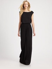 Complemented by an elastic waistband, this slightly shirred maxi dress has a boatneck, cap sleeves and sultry side slit. BoatneckCap sleevesElastic waistbandSide slitAbout 40 from natural waist92% modal/8% spandexDry cleanMade in USAModel shown is 5'10 (177cm) wearing US size Small.