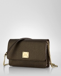 Designed as a chic city companion, this Lauren Ralph Lauren crossbody bag is crafted of a rich leather and crowned with a fold-over flap closure.