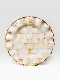 An extraordinary addition to your place setting, this one-of-a-kind masterpiece features hand-painted terra cotta with color-dragged checks and golden trim.Ceramic with golden lustre11 diam.Hand washMade in the USA