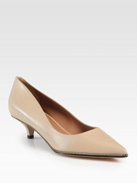 Goldtone zipper trim adds texture to this point-toe leather pump with a low kitten heel. Self-covered heel, 2¼ (60mm)Leather upper with zipper trimPoint toeLeather lining and solePadded insoleMade in Italy