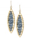 A stunning display takes shape in this pair of oval drop earrings from Kenneth Cole New York. Crafted from gold-tone mixed metal, the earrings dazzle with striking blue cherry beads in the center. Approximate drop: 2-1/2 inches.