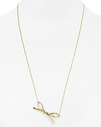 Take a bow. Cast in 12-karat gold plate, this delicate kate spade new york necklace flaunts a sweet simplicity.