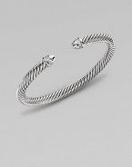 From the Color Classic Collection. A signature Yurman cable of sterling silver, richly enhanced by bands of pavé diamonds, encircling the end caps. Diamonds, 0.09 tcw Sterling silver Cable, 5mm Diameter, about 2½ Made in USA