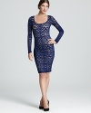 In swirling lace, BCBGMAXAZRIA's form-fitting sheath dress goes bold in an orient blue hue.