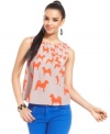 A bright dog print adds an irreverent flair to this Bar III top -- perfect for a quirky-cool look!