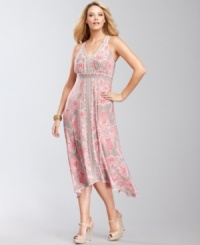 Floaty and ethereal, INC's plus size printed dress features sexy straps and an adorable handkerchief hem!