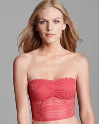 Sheer blouses get a chic, new look with this Free People lace bandeau layered underneath. Style #F153F944.