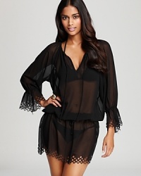 Lattice, laser-cut edging defines this sweepingly romantic Gottex swim coverup-set sail for destination anywhere.