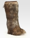 Faux fur essential with a hidden wedge and an adjustable toggle top.Hidden wedge, 3½ (90mm) Shaft, 15 Leg circumference, 15 Faux fur upper Nylon lining Rubber lug sole Padded insole Imported Please note: Colors may vary.OUR FIT MODEL RECOMMENDS ordering one half size up as this style runs small. 