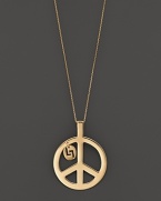 A simple, elegant peace sign in 14K yellow gold. By Lana.