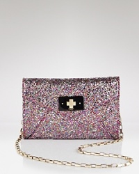 A glittering look and feel meets a cool sized-down shape-so perfect for going day to night, and just about everywhere in between. From kate spade new york.