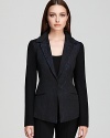 Patterned jacquard takes a sophisticated form in dark, classic hues on this smart Elie Tahari blazer.