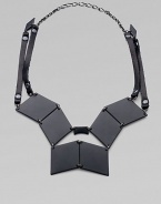 Pieced together diamond-shape brass plaques and strips of rich Italian leather come together in this street-smart, edgy design.Black, powder-coated brassLeatherHematite finish chainLength, about 19Lobster claspMade in USA