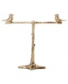 Perched with panache. Fossil's tree stand with two birds makes a stylish piece of decor for any room. Crafted in gold tone mixed metal. Approximate length: 5-1/4 inches.