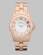 Colorful crystals accent the logo dial on this simply chic, stainless steel style. Quartz movementWater resistant to 5 ATMRound rose goldtone ion-plated stainless steel case, 40mm (1.6) Smooth bezelWhite dialCrystal accented and smooth logo hour markersSecond hand Rose goldtone ion-plated stainless steel link braceletImported 