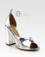 Mirrored metallic leather in a feminine d'Orsay silhouette, topped with an interchangeable, clear ankle strap and chunky block heel. Self-covered heel, 4 (100mm)Metallic leather upperLeather lining and solePadded insoleImportedPlease note: Silver and clear ankle straps are included. 