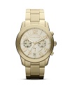 Get it right office or off duty with this handsome Michael Kors watch, which crafts a sophisticated statement with its champagne-colored dial, surrounded by plated gold.