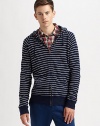 Nautical inspirations overtake a traditional zip-up hoodie, offering a sporty, yet sophisticated finish.Zip frontAttached drawstring hoodKangaroo pocketsBanded cuffs and hemCottonDry cleanImported