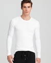 Cut slim for a body-contouring fit, this long sleeve tee shows off your build in soft, breathable cotton for comfort.