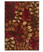 A warm, inviting color palette is woven over earthy brown in a stunning leaf and branch design from Nourison. Hand tufted of long polyester fibers for added strength and softness, the Contour area rug creates an ideal accent for any modern room. (Clearance)