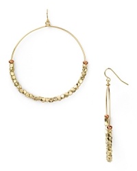 Work this season's exotic influences into your accessories collection with this pair of beaded hoop earrings from Vanessa Mooney, accented by an eclectic mix of golden nuggets.