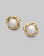 From the Infinity Collection. Two elegant, intertwined bands of 18k yellow gold surround an exquisite, naturally hued pearl. 6mm white pearls 18k yellow gold Diameter, about ½ Post back Imported