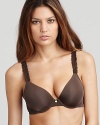 Contour underwire bra with lace adjustable straps. Small goldtone charm with logo detail at center front. Hook and eye closure. Style #136001