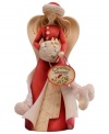 With a flowing red dress and her hand nestled in a muff, this lovely angel figurine delivers warm wishes to your home with the phrase: Christmas Blessings. With crystal embellishments.