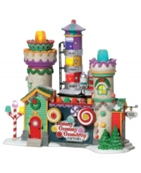 Get a taste of what goes on at the Yummy Gummy Gumdrop Factory by Department 56. A tower of fruit flavors, candy cane lamppost and sugar-coated assembly line prove irresistible to every sweet tooth in North Pole Village.