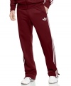 From warm up to cool down, the fresh retro-inspired look of these sleek adidas track pants will never go out of style.