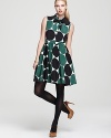 Rendered in fluid silk, this kate spade new york dress beams with a crisp polka-dot print. Finish with polished heels and a dash of pearls for pure feminine charm.