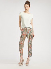 Classic trousers get a touch of feminine chic in printed silk with a hint of stretch.Wide waistband with belt loopsFront zip with hook-and-bar closureInverted pleatsSide slash pocketsBack slash pocketsCuffed legsRise, about 10Inseam, about 2995% silk/5% spandexDry cleanImportedModel shown is 5'10 (177cm) wearing US size 4.