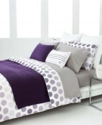 Spot on. Lined dots in shades of purple give this Lacoste duvet cover set a decidedly mod appeal. Featuring hidden button closure. Self-reversing; finished with a solid piped edge.