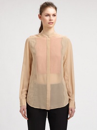 Tantalizingly sheer silk chiffon is luxuriously detailed with lace insets at the sides and sleeves, plus an inside floating front bib that adds graceful discretion.Satin band collarLong sleeves with satin button cuffsHidden button placketShirttail hemAbout 30 from shoulder to hemSilkDry cleanImported of Italian fabricSIZE & FITModel shown is 5'10 (177cm) wearing US size 4. This style runs large. 